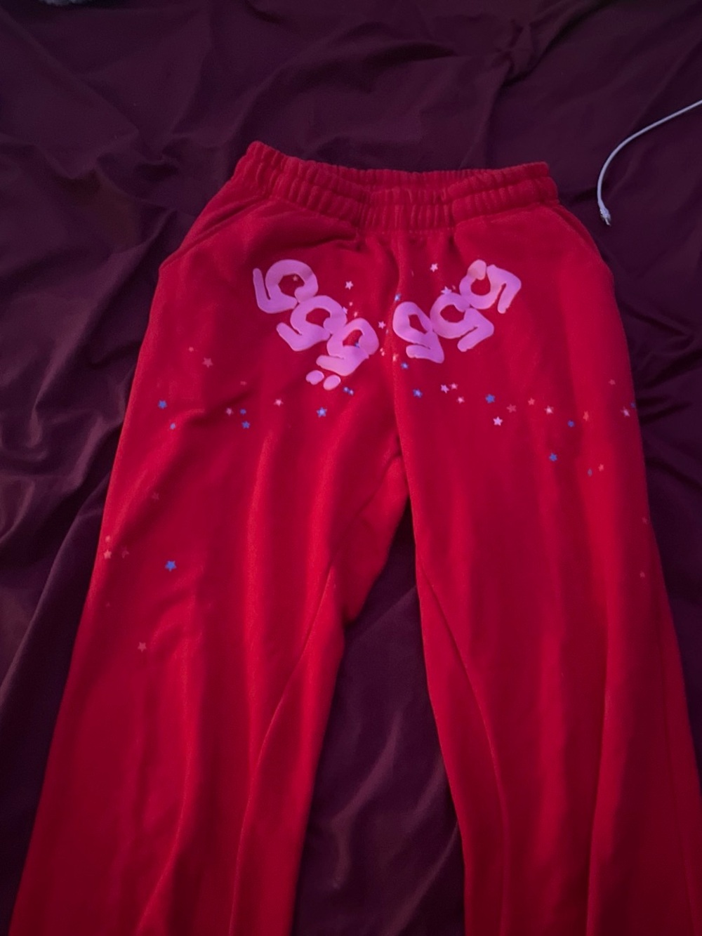 Red Sp5der Joggers with Pink “555” Puffer Text and Star Accents
